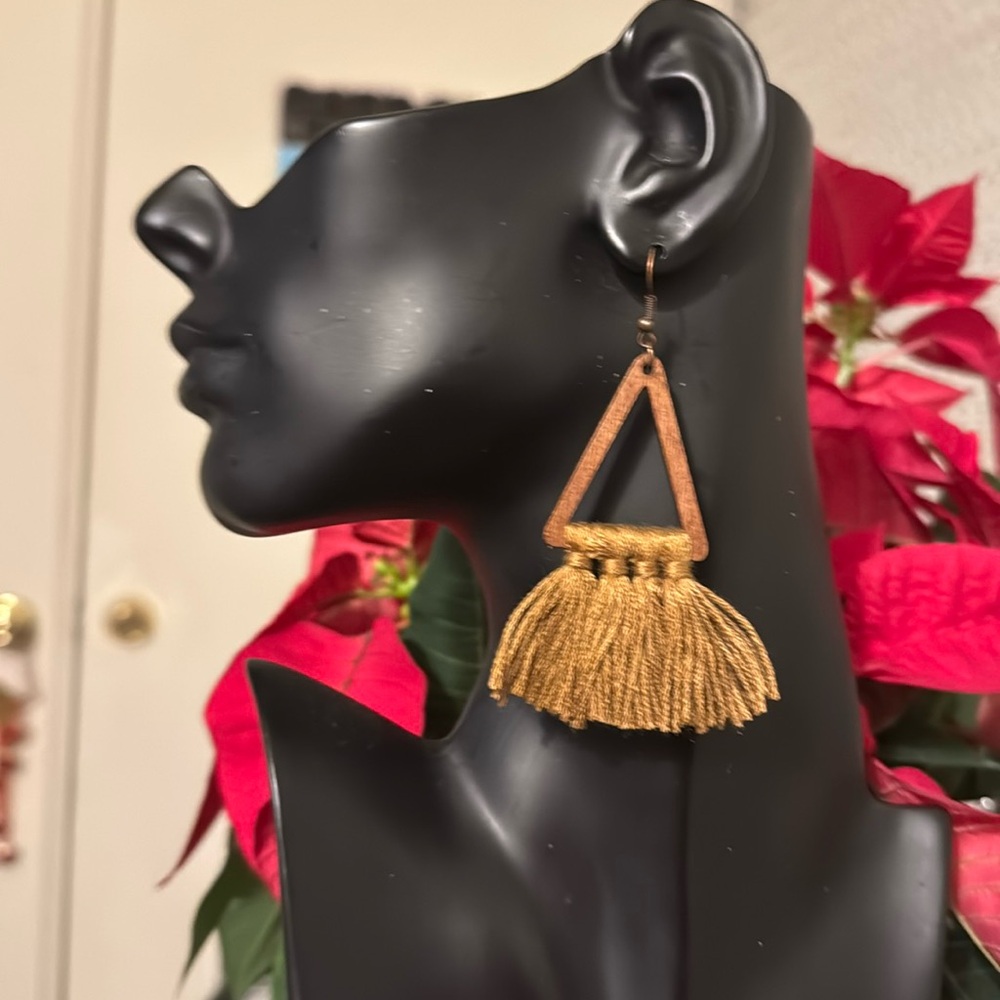 Beautiful long tan earrings.